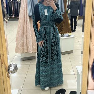 Traditional blue and black Palestinian tatreez thobe dress
